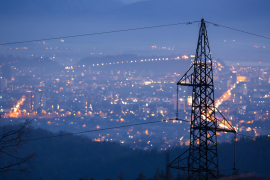 Image City by night with power line Credit: Shutterstock